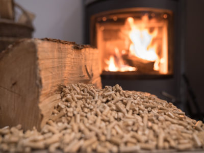 Wood stove heating with in foreground wood pellets - economical heating system concept