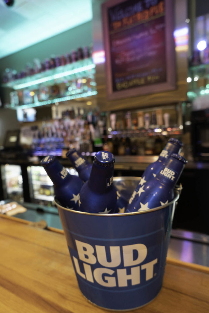 photo of bud light bucket filled with beers on dysart's bar