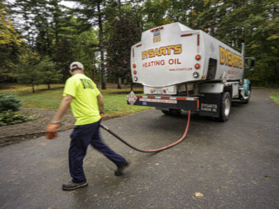 photo of man delivering Home Heating Oil